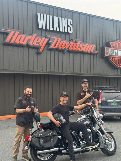 Rocket with the team at Wilkins Harley-Davidson, a local Eat Vermont partner